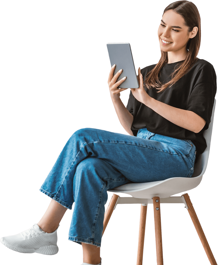 woman with tablet sitting on chair working online3 WVXKH5Z 1